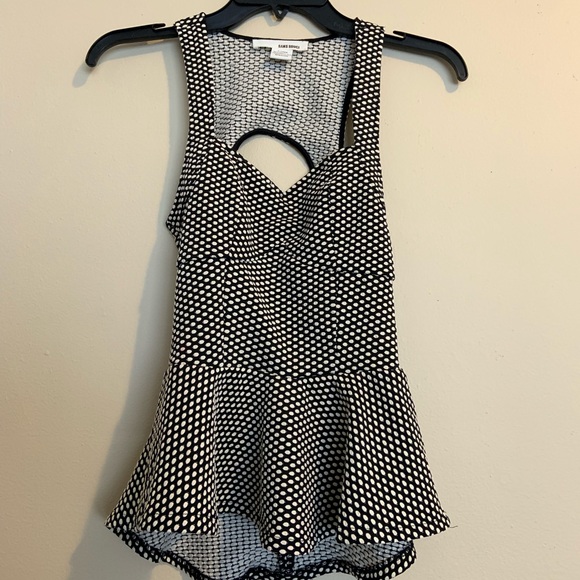 Polka Dot Peplum 
Sleeveless Shirt